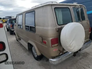 1989 Chevrolet Chevy Van z VIN 1GBEG25K2K7120100, wystawiony jako Copart lot #75508934 z przebiegiem Nie podano mil oraz Szkody całkowita. Historia ofert i sprzedaży dostępna na DreamBid. Obrazek 2.