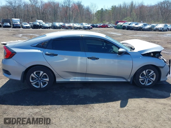 2017 Honda Civic LX z VIN 2HGFC2F53HH513655, wystawiony jako IAAI lot #41968212 z przebiegiem 112 672 mil mil oraz . Historia ofert i sprzedaży dostępna na DreamBid. Obrazek 13.