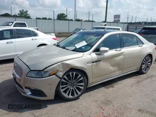 2017 Lincoln Continental Select z VIN 1LN6L9SK0H5631653, wystawiony jako IAAI lot #42092357 z przebiegiem Nie podano mil oraz . Historia ofert i sprzedaży dostępna na DreamBid. Obrazek 2.