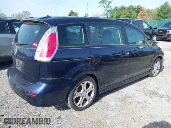 2010 Mazda 5 Sport with VIN JM1CR2W39A0388301, listed as a IAAI auction lot 42077549 with 128,371 mi miles and . Bid and sale history available at DreamBid. Image 4.