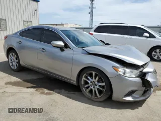2014 Mazda 6 i Sport with VIN JM1GJ1U6XE1159917, listed as a Copart auction lot 52995325 with 97,652 mi miles and Salvage Title. Bid and sale history available at DreamBid. Image 4.