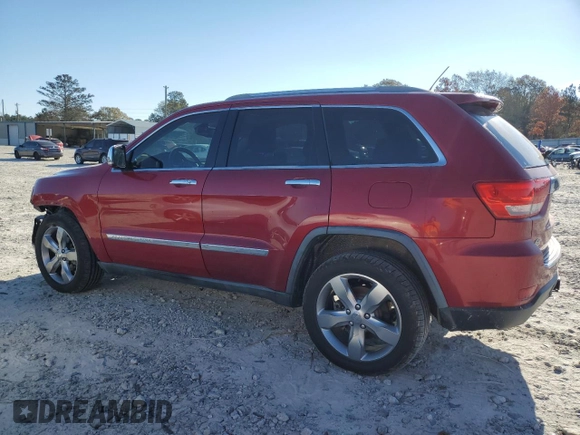 2011 Jeep Grand Cherokee Overland with VIN 1J4RS6GG7BC665979, listed as a Copart auction lot 83394214 with 216,988 mi miles and Salvage Title. Bid and sale history available at DreamBid. Image 2.