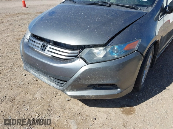 2011 Honda Insight EX with VIN JHMZE2H77BS006244, listed as a IAAI auction lot 41774240 with Not Provided miles and . Bid and sale history available at DreamBid. Image 6.
