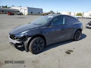 2024 Tesla Model Y Long Range z VIN 7SAYGDEE8RF184146, wystawiony jako Copart lot #61194535 z przebiegiem 8 225 mil mil oraz Szkoda całkowita • Salvage title. Historia ofert i sprzedaży dostępna na DreamBid. Obrazek 1.