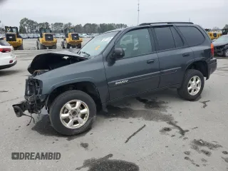2004 GMC Envoy SLE with VIN 1GKDS13S942432115, listed as a Copart auction lot 43817125 with 147,228 mi miles and Salvage Title. Bid and sale history available at carsss.com. Image 1.