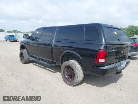 2015 Ram 2500 Laramie with VIN 3C6UR5FL0FG655552, listed as a IAAI auction lot 42456897 with 143,885 mi miles and . Bid and sale history available at DreamBid. Image 3.