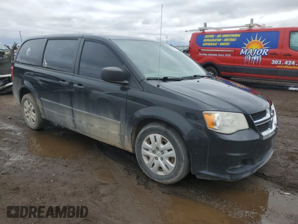2015 Dodge Grand Caravan SE with VIN 2C4RDGBG7FR516773, listed as a Copart auction lot 52035135 with 132,122 mi miles and Salvage Title. Bid and sale history available at DreamBid. Image 4.