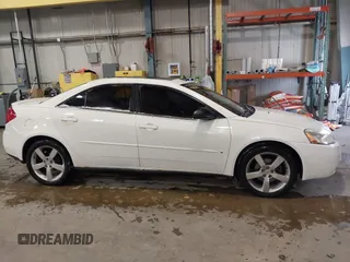 2006 Pontiac G6 GTP z VIN 1G2ZM571664226430, wystawiony jako IAAI lot #41315375 z przebiegiem 219 985 mil mil oraz . Historia ofert i sprzedaży dostępna na DreamBid. Obrazek 13.