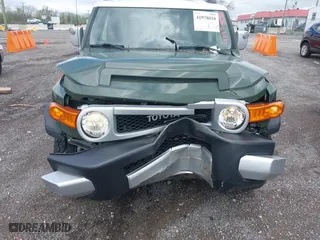 2014 Toyota FJ Cruiser with VIN JTEBU4BF1EK203587, listed as a IAAI auction lot 41978010 with 62,438 mi miles. Bid and sale history available at carsss.com. Image 12.