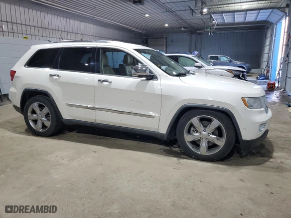 2012 Jeep Grand Cherokee Overland with VIN 1C4RJFCT5CC185100, listed as a Copart auction lot 42745615 with 126,696 mi miles and Salvage Title. Bid and sale history available at carsss.com. Image 4.