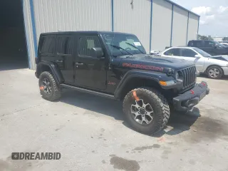 2022 Jeep Wrangler Unlimited Rubicon with VIN 1C4HJXFG1NW193437, listed as a Copart auction lot 57137365 with 56,732 mi miles and Salvage title. Bid and sale history available at DreamBid. Image 4.