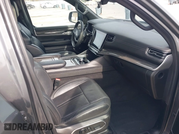 2022 Jeep Wagoneer Series III with VIN 1C4SJVDT1NS216457, listed as a IAAI auction lot 41690268 with 79,145 mi miles and . Bid and sale history available at DreamBid. Image 5.