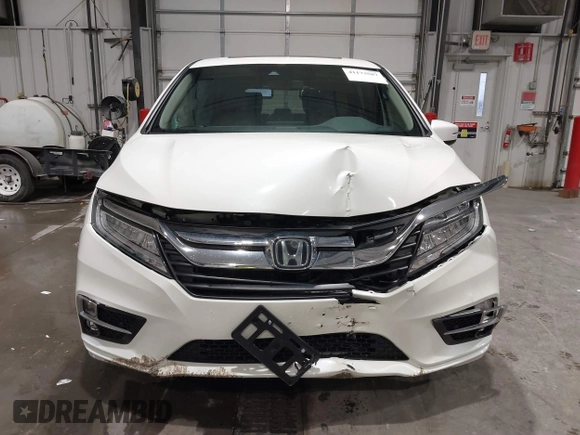 2019 Honda Odyssey Touring with VIN 5FNRL6H83KB051363, listed as a IAAI auction lot 41173587 with 88,512 mi miles. Bid and sale history available at carsss.com. Image 11.