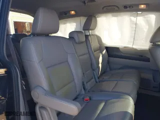 2016 Honda Odyssey EX-L with VIN 5FNRL5H63GB050617, listed as a IAAI auction lot 41678167 with 128,000 mi miles. Bid and sale history available at carsss.com. Image 8.