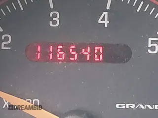 2004 Pontiac Grand Am SE with VIN 1G2NE52F94M530881, listed as a IAAI auction lot 41648302 with 116,540 mi miles. Bid and sale history available at carsss.com. Image 16.