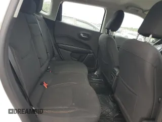 2018 Jeep Compass Sport z VIN 3C4NJCAB3JT123431, wystawiony jako Copart lot #63045144 z przebiegiem 118 849 mil mil oraz Szkoda całkowita • Salvage title. Historia ofert i sprzedaży dostępna na DreamBid. Obrazek 11.