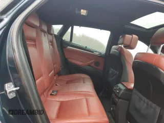2013 BMW X6 xDrive35i z VIN 5UXFG2C55DL788611, wystawiony jako Copart lot #50972395 z przebiegiem 131 755 mil mil oraz Szkoda całkowita • Salvage title. Historia ofert i sprzedaży dostępna na DreamBid. Obrazek 11.