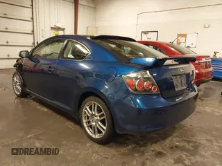 2009 Scion tC with VIN JTKDE167990297921, listed as a IAAI auction lot 41720687 with 159,960 mi miles. Bid and sale history available at carsss.com. Image 3.
