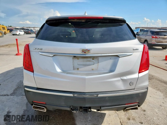 2017 Cadillac XT5 Luxury FWD z VIN 1GYKNBRS2HZ159582, wystawiony jako Copart lot #62429475 z przebiegiem 99 188 mil mil oraz Czysty tytuł • Clean title. Historia ofert i sprzedaży dostępna na DreamBid. Obrazek 6.