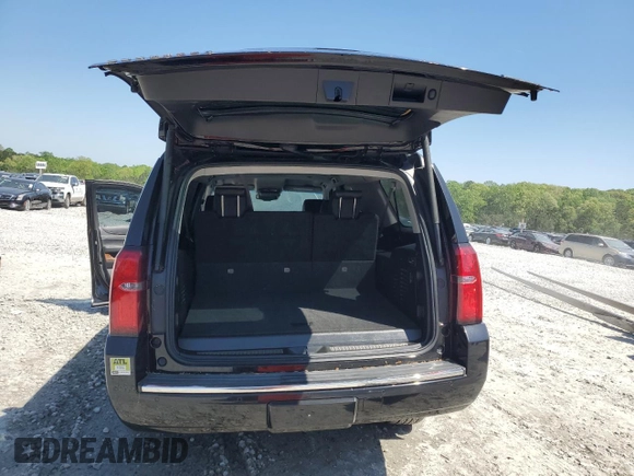 2018 Chevrolet Suburban Premier with VIN 1GNSCJKC1JR199271, listed as a Copart auction lot 52395935 with 216,083 mi miles and Salvage Title. Bid and sale history available at DreamBid. Image 6.