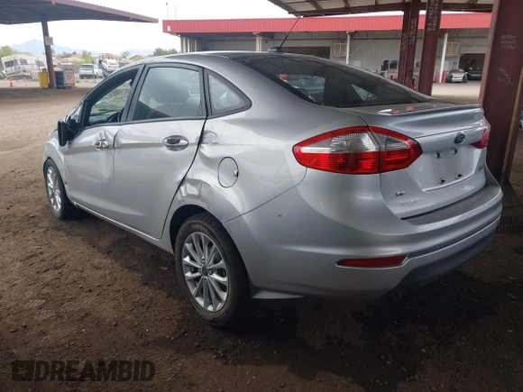 2014 Ford Fiesta SE with VIN 3FADP4BJ9EM196038, listed as a IAAI auction lot 41916159 with 85,582 mi miles. Bid and sale history available at carsss.com. Image 3.