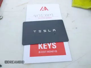2021 Tesla Model Y Performance z VIN 5YJYGDEF8MF209819, wystawiony jako IAAI lot #41757009 z przebiegiem 37 685 mil mil oraz . Historia ofert i sprzedaży dostępna na DreamBid. Obrazek 11.