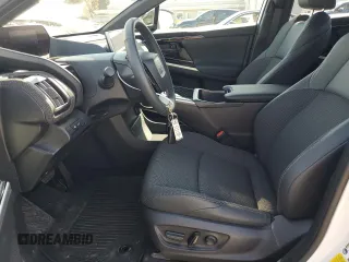 2024 Toyota bZ4X XLE with VIN JTMABACA8RA073861, listed as a Copart auction lot 50030475 with 6,465 mi miles and Salvage Title. Bid and sale history available at DreamBid. Image 7.