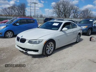 2013 BMW 3 Series 328i xDrive with VIN WBAKF3C52DJ385588, listed as a IAAI auction lot 41892255 with 150,061 mi miles. Bid and sale history available at carsss.com. Image 2.