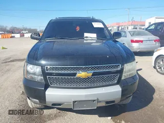 2011 Chevrolet Suburban LT with VIN 1GNSCJE06BR293634, listed as a IAAI auction lot 41742616 with 204,222 mi miles. Bid and sale history available at carsss.com. Image 12.