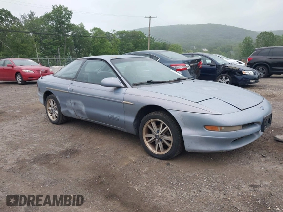 1995 Ford Probe z VIN 1ZVLT20A6S5154983, wystawiony jako IAAI lot #42301574 z przebiegiem 128 515 mil mil oraz . Historia ofert i sprzedaży dostępna na DreamBid. Obrazek 1.