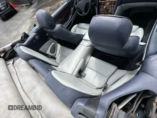 2001 Aston Martin Vantage z VIN SCFAB42321K402008, wystawiony jako Copart lot #59334855 z przebiegiem 60 444 mil mil oraz Szkody całkowita. Historia ofert i sprzedaży dostępna na DreamBid. Obrazek 6.