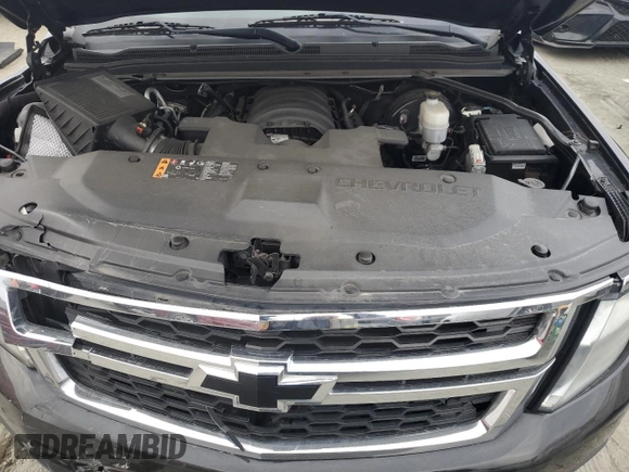 2019 Chevrolet Suburban LT with VIN 1GNSCHKC8KR127431, listed as a Copart auction lot 43931515 with 123,338 mi miles and Salvage Title. Bid and sale history available at DreamBid. Image 12.