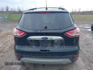 2013 Ford Escape SEL with VIN 1FMCU9HX9DUA69853, listed as a IAAI auction lot 42037021 with 132,166 mi miles and . Bid and sale history available at DreamBid. Image 17.