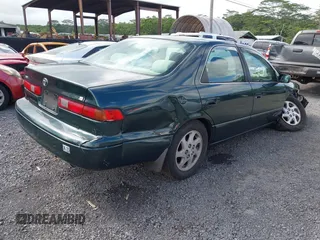 1999 Toyota Camry LE z VIN JT2BF22K2X0164080, wystawiony jako IAAI lot #40984874 z przebiegiem Nie podano mil oraz . Historia ofert i sprzedaży dostępna na DreamBid. Obrazek 4.