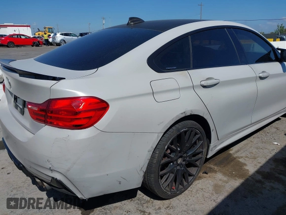 2015 BMW 4 Series 428i xDrive with VIN WBA4C9C54FD330582, listed as a IAAI auction lot 42135691 with 127,289 mi miles and . Bid and sale history available at DreamBid. Image 17.