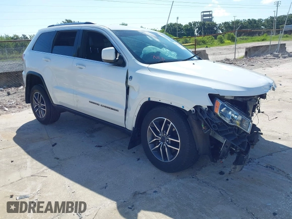 2020 Jeep Grand Cherokee Laredo with VIN 1C4RJFAG5LC258309, listed as a IAAI auction lot 42573007 with 68,980 mi miles and . Bid and sale history available at DreamBid. Image 1.
