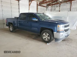 2016 Chevrolet Silverado 1500 LT with VIN 1GCUKREC9GF164552, listed as a Copart auction lot 52196485 with 105,668 mi miles and Salvage Title. Bid and sale history available at DreamBid. Image 4.