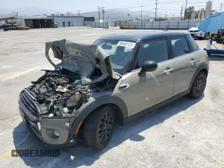2019 MINI Hardtop 4 Door Cooper z VIN WMWXU1C57K2J03050, wystawiony jako Copart lot #58446125 z przebiegiem 67 057 mil mil oraz Szkoda całkowita • Salvage title. Historia ofert i sprzedaży dostępna na DreamBid. Obrazek 1.