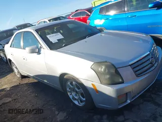 2003 Cadillac CTS with VIN 1G6DM57N330121486, listed as a IAAI auction lot 41312099 with 202,203 mi miles. Bid and sale history available at carsss.com. Image 1.
