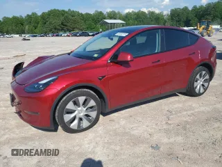 2024 Tesla Model Y Long Range z VIN 7SAYGAEEXRF071829, wystawiony jako Copart lot #56003215 z przebiegiem 29 446 mil mil oraz Szkoda całkowita • Salvage title. Historia ofert i sprzedaży dostępna na DreamBid. Obrazek 1.