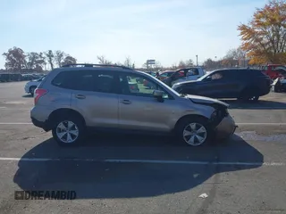 2015 Subaru Forester 2.5i Premium with VIN JF2SJADC4FH409078, listed as a IAAI auction lot 40731696 with 171,874 mi miles. Bid and sale history available at carsss.com. Image 13.