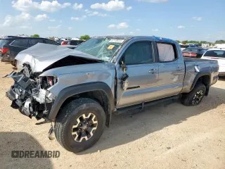 2020 Toyota Tacoma SR5 with VIN 3TMDZ5BNXLM084567, listed as a Copart auction lot 62149035 with 82,912 mi miles and Clean title. Bid and sale history available at DreamBid. Image 1.