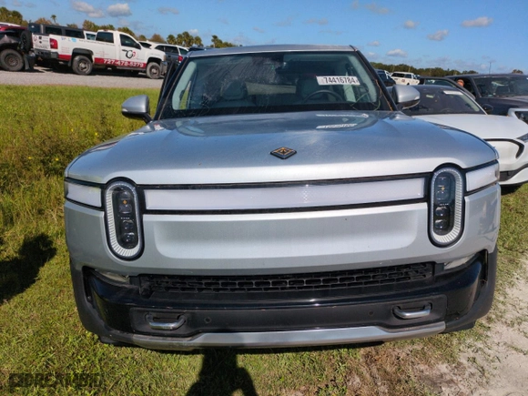 2023 Rivian R1T Adventure with VIN 7FCTGAAA5PN019317, listed as a Copart auction lot 74416784 with 11,508 mi miles and Salvage Title. Bid and sale history available at carsss.com. Image 5.