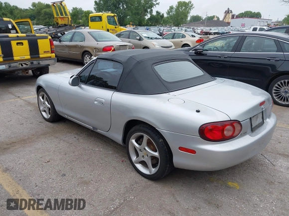 2002 Mazda MX-5 Miata Cloth with VIN JM1NB353820229890, listed as a IAAI auction lot 42750045 with 116,227 mi miles and . Bid and sale history available at DreamBid. Image 3.
