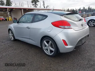 2012 Hyundai Veloster w/Gray Int with VIN KMHTC6AD8CU063977, listed as a IAAI auction lot 41494419 with 192,179 mi miles and . Bid and sale history available at DreamBid. Image 3.