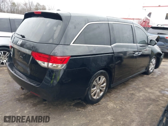2016 Honda Odyssey EX-L with VIN 5FNRL5H65GB093937, listed as a IAAI auction lot 41691669 with 264,960 mi miles and . Bid and sale history available at DreamBid. Image 4.