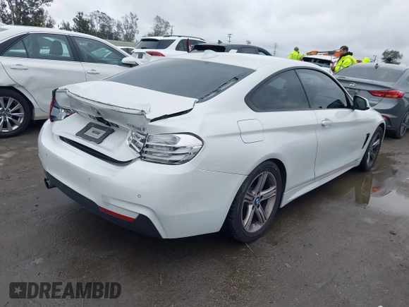2015 BMW 4 Series 428i with VIN WBA3N7C58FK222925, listed as a IAAI auction lot 41776858 with 106,946 mi miles and . Bid and sale history available at carsss.com. Image 4.