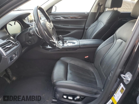 2019 BMW 7 Series 740i with VIN WBA7E2C52KB217153, listed as a Copart auction lot 65205835 with 61,981 mi miles and Clean title. Bid and sale history available at DreamBid. Image 7.