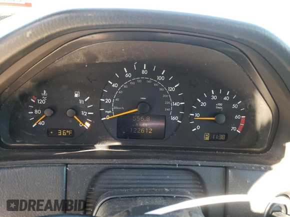 2000 Mercedes-Benz E-Class with VIN WDBJF82J5YX030071, listed as a Copart auction lot 42430025 with 122,612 mi miles and Salvage Title. Bid and sale history available at carsss.com. Image 9.