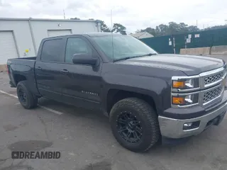 2015 Chevrolet Silverado 1500 LT with VIN 3GCUKREC9FG519510, listed as a IAAI auction lot 42026865 with 119,510 mi miles and . Bid and sale history available at DreamBid. Image 1.